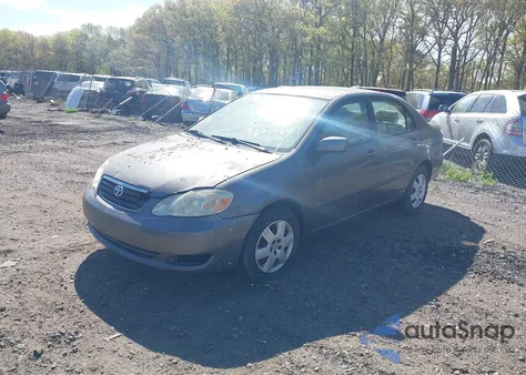 2005 Toyota Corolla Le из США, поврежденный, VIN 2T1BR30E55C400130